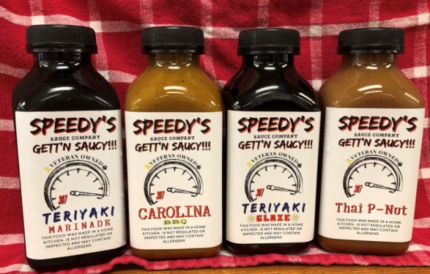 Bottles of Speedy's teriyaki, Carolina barbecue and Thai P-Nut sauce